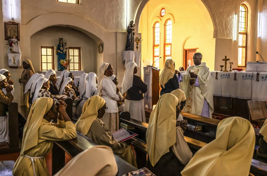 Sisters gathered together in a chapel